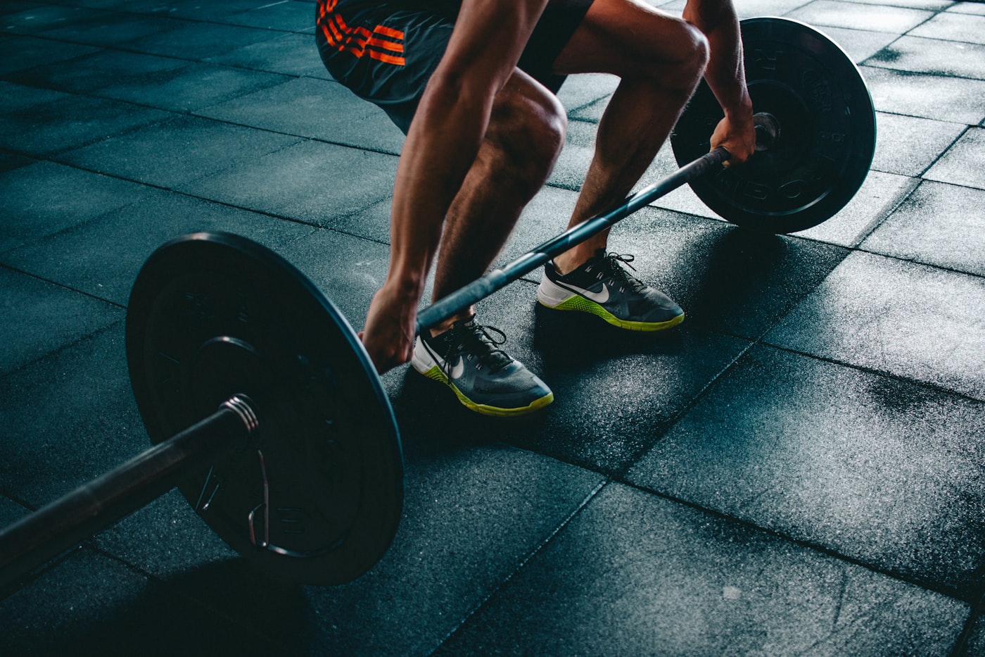 Athlete performing dumbbell exercise